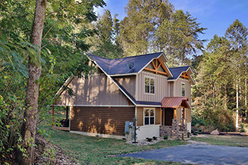 misty mountainside cabin